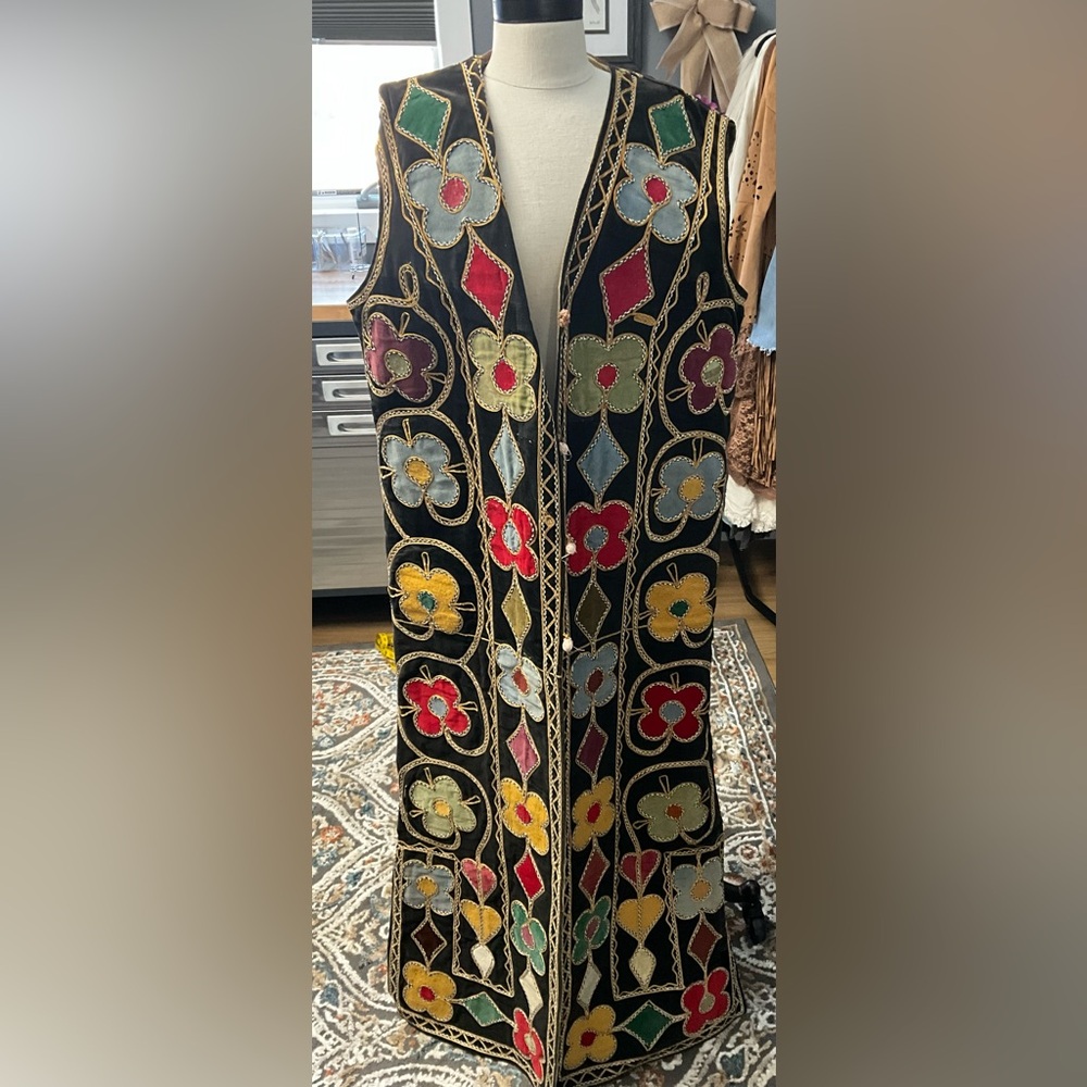 Floral Embroidered Black Maxi.vest..
Suede jacket from the very early 70’s